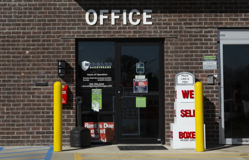 a brick building with a sign on the front