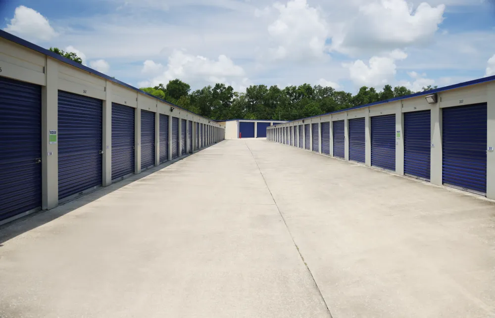 a row of blue and white garage doors