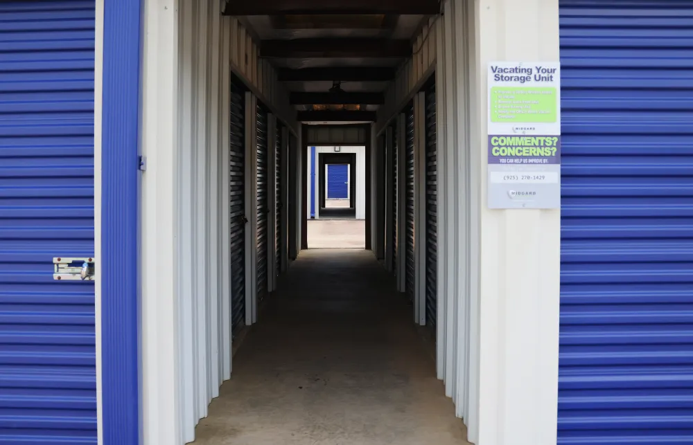 a hallway with blue doors