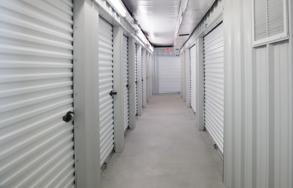 a long hallway with white doors