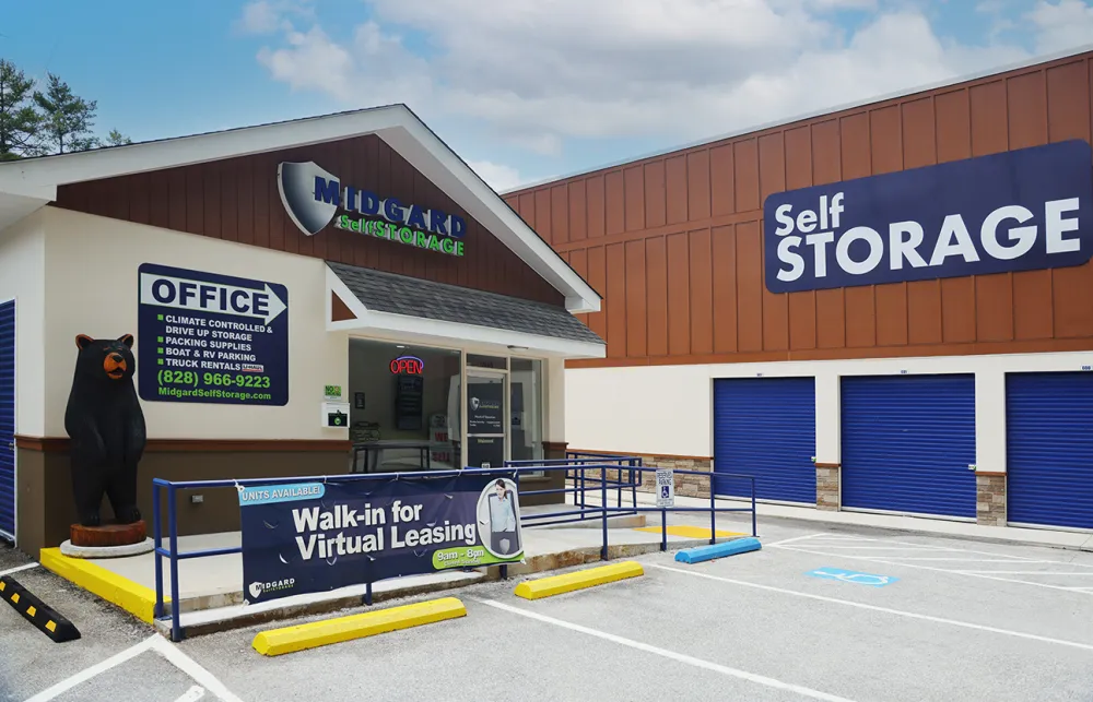 a bear statue in front of a store