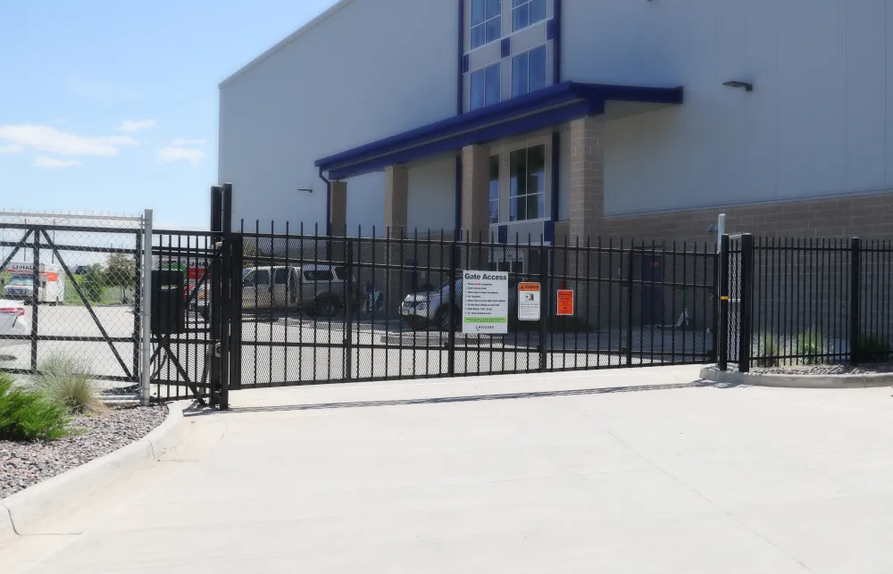 a building with a black fence