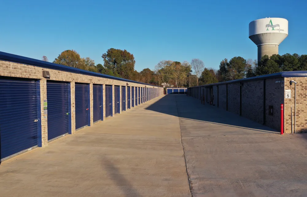 a row of blue and white shipping containers