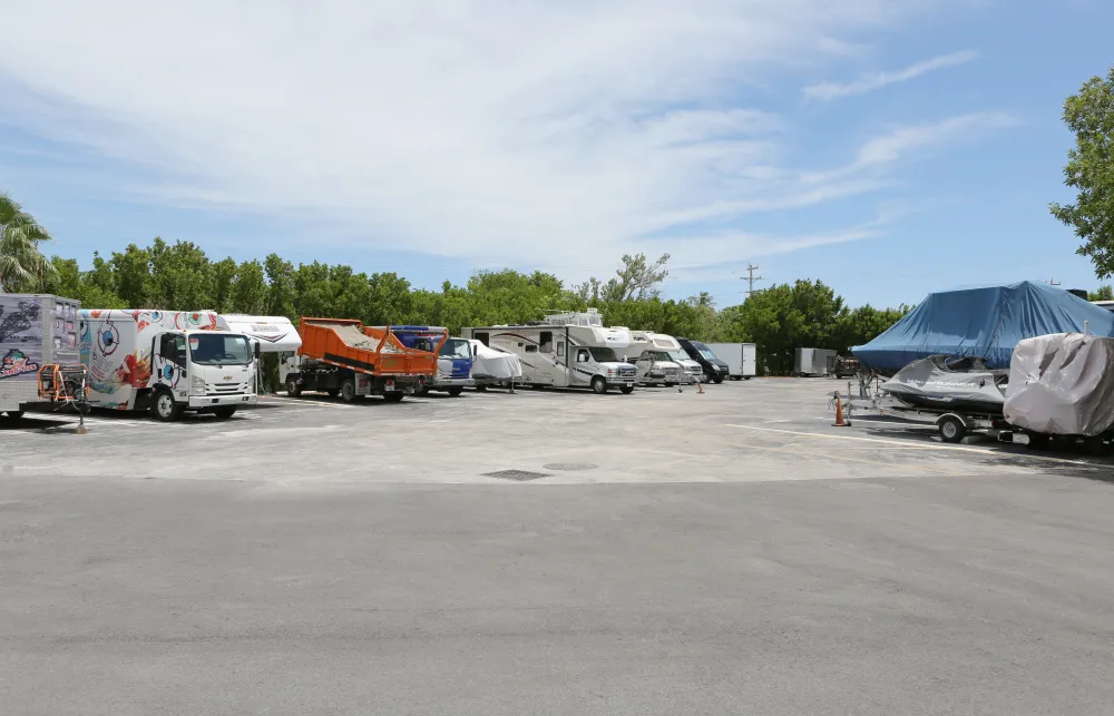 a group of vehicles parked in a parking lot