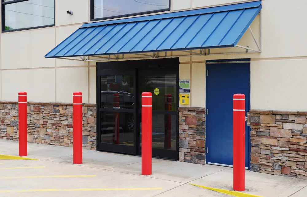 a building with a blue awning