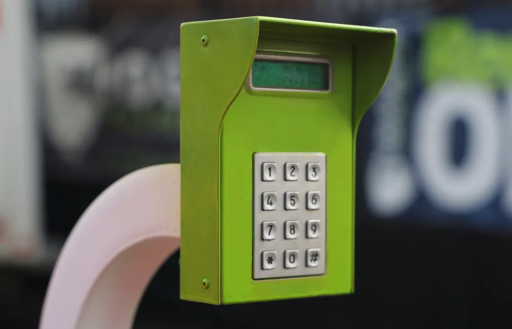 a green phone on a table