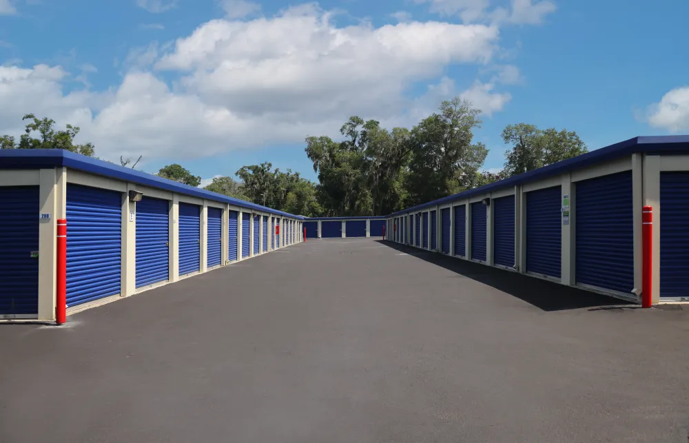 a row of blue and white shipping containers