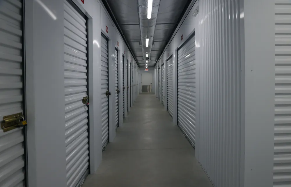 a long hallway with rows of computer servers