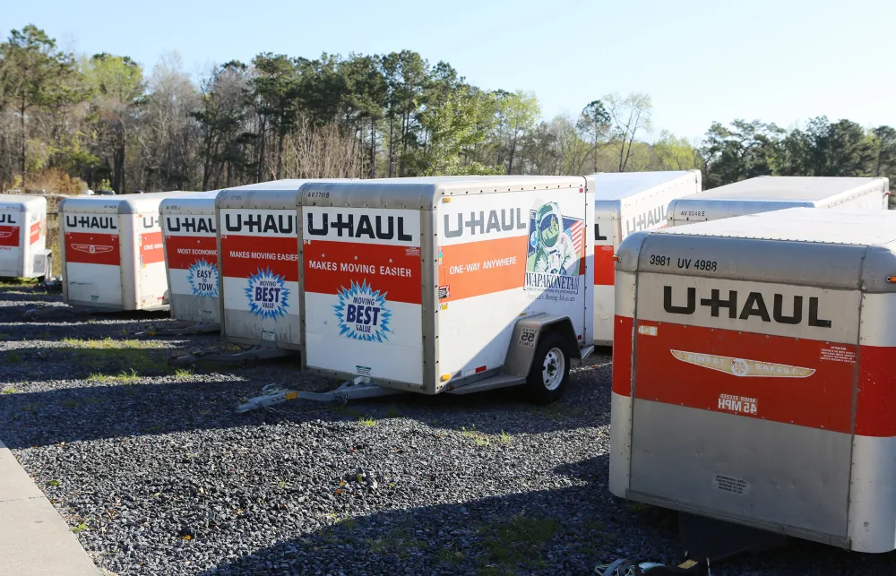 a group of white and orange trailers