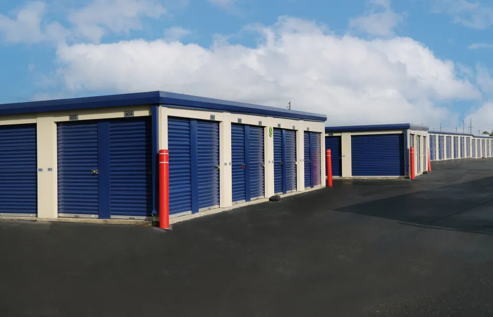 a row of blue and white garage doors