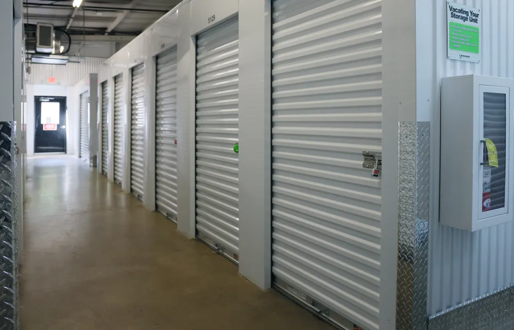 a hallway with white lockers