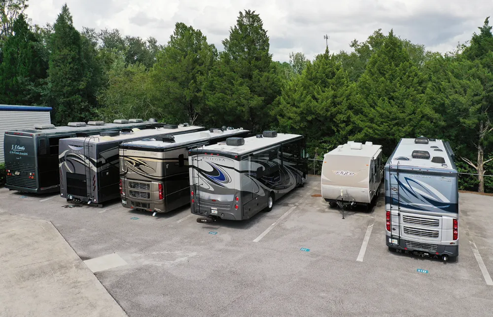 a group of trucks parked in a parking lot