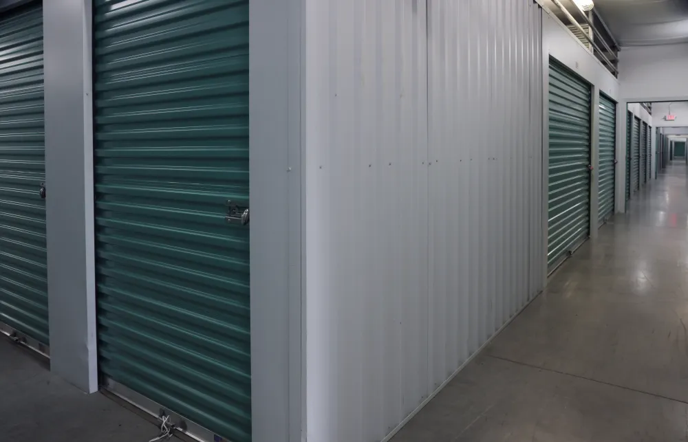 a hallway with white lockers