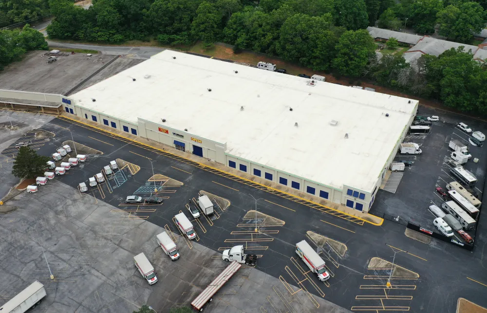 a building with a parking lot