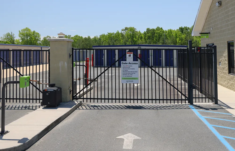 a gate with a sign on it