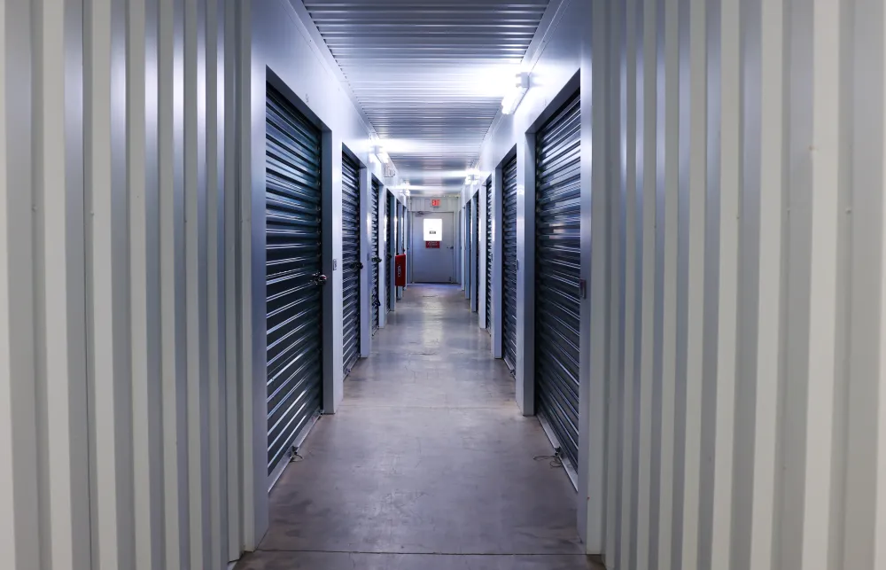 a long hallway with rows of computer servers