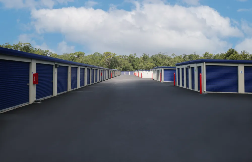 a row of blue and white shipping containers