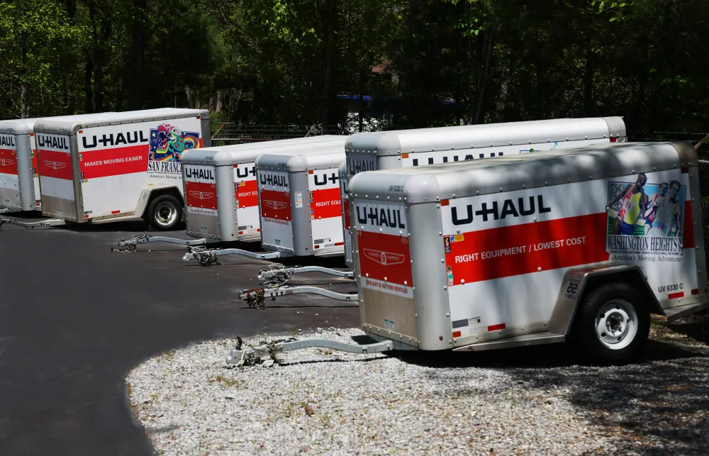 a group of white and red trucks