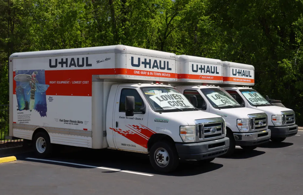 a white truck with a white trailer