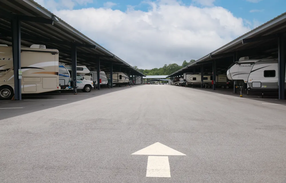 a group of rvs parked at a gas station