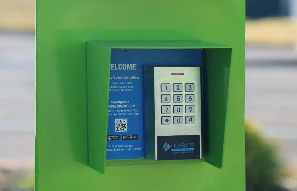 a green box with a white and blue screen