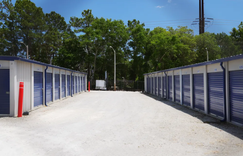 a row of white and blue shipping containers