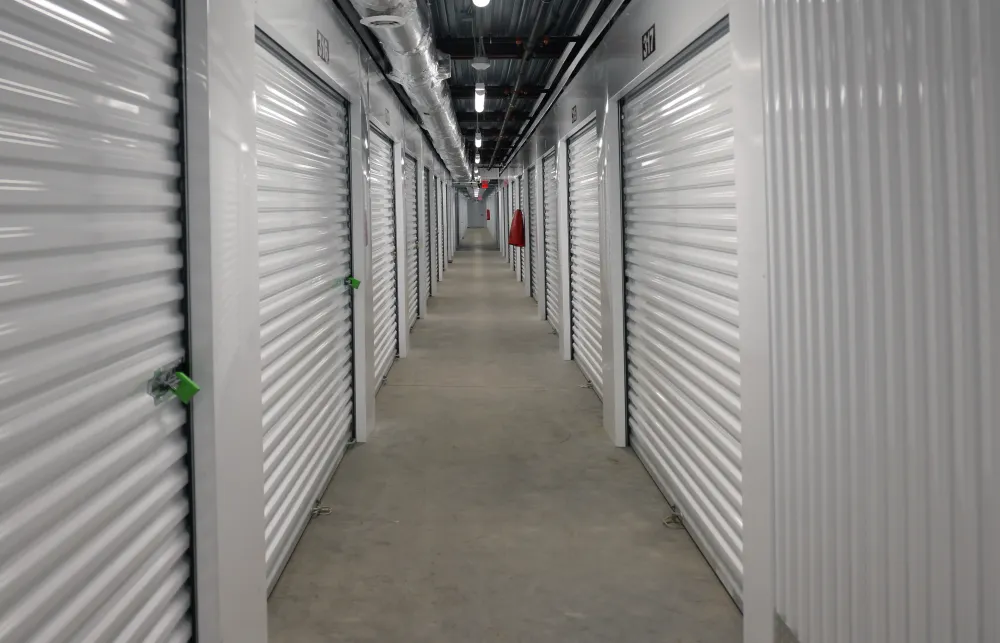 a long hallway with rows of computer servers