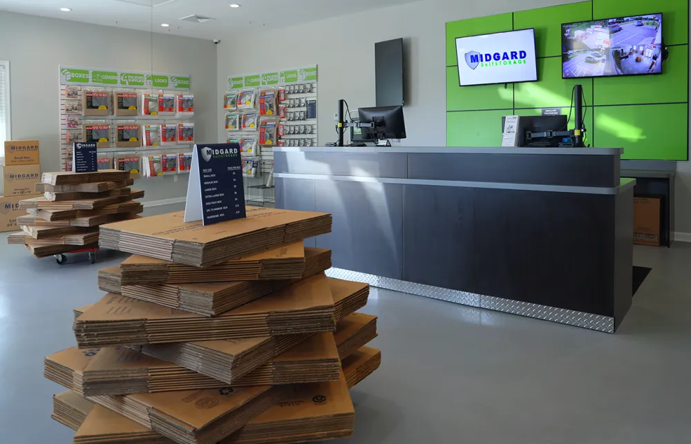 a room with a table and shelves with books on it