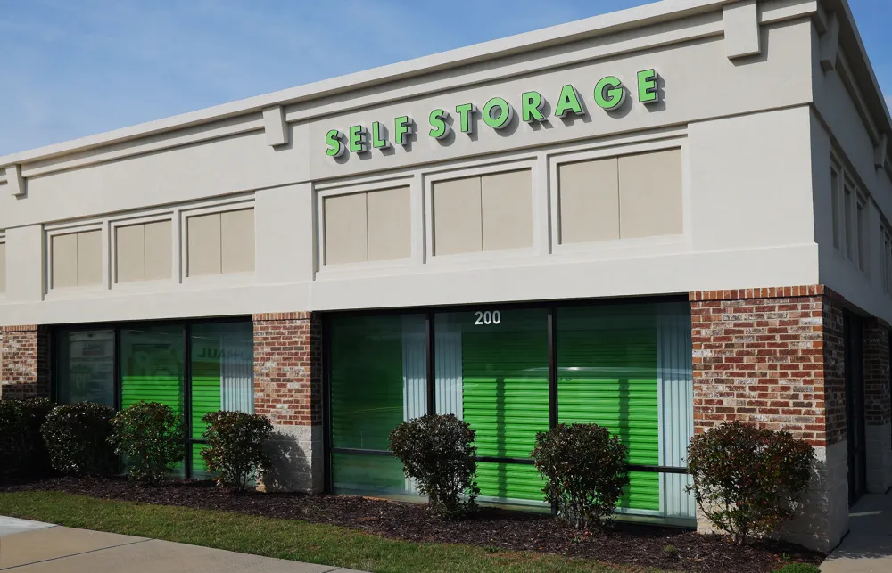 a building with green lettering