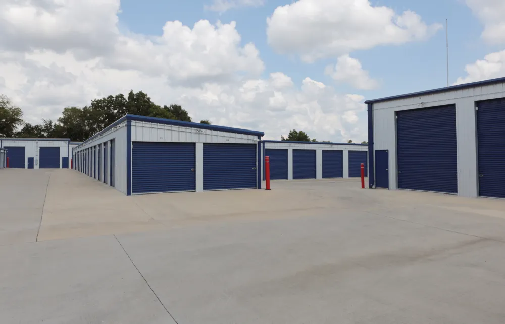 a group of blue and white garages