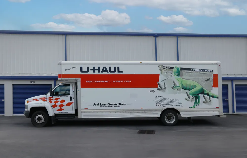 a white truck with a cartoon character on the side