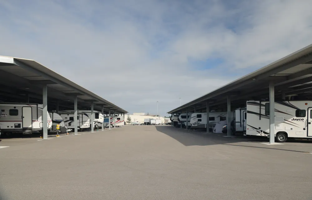 a group of rvs parked in a parking lot