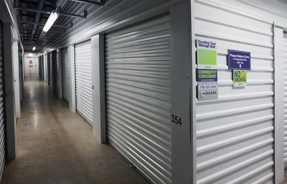 a hallway with white lockers