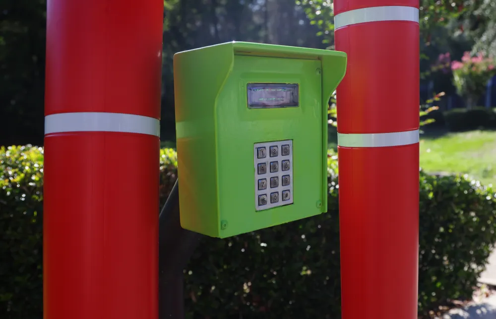 a green and red mailbox