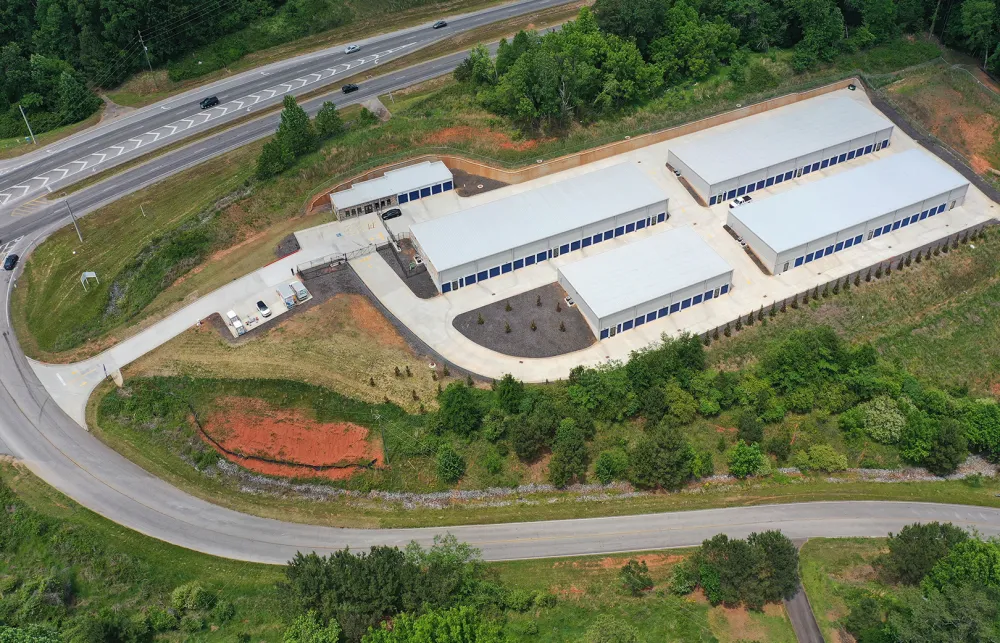 a large building with a parking lot