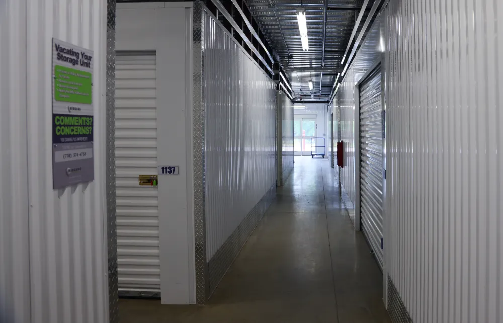 a long hallway with white walls