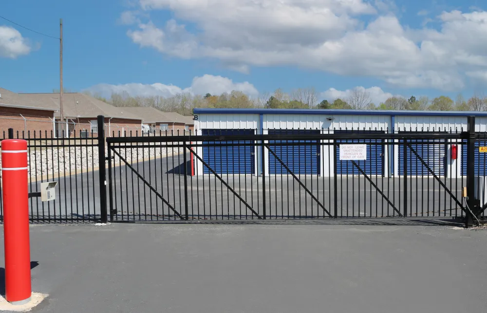 a metal fence with a metal gate