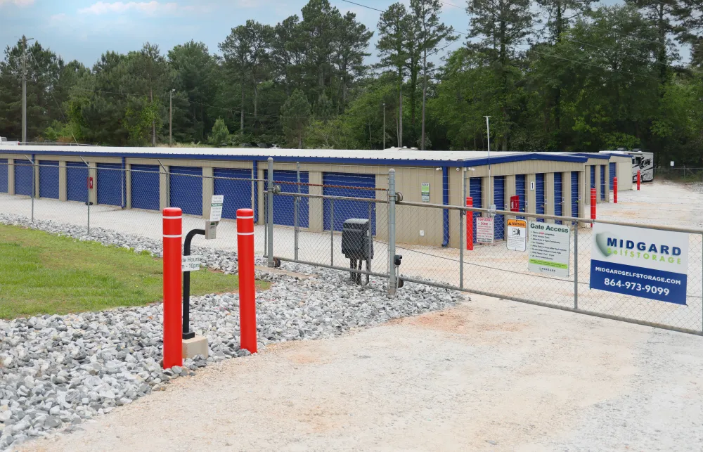 a construction site with a blue fence