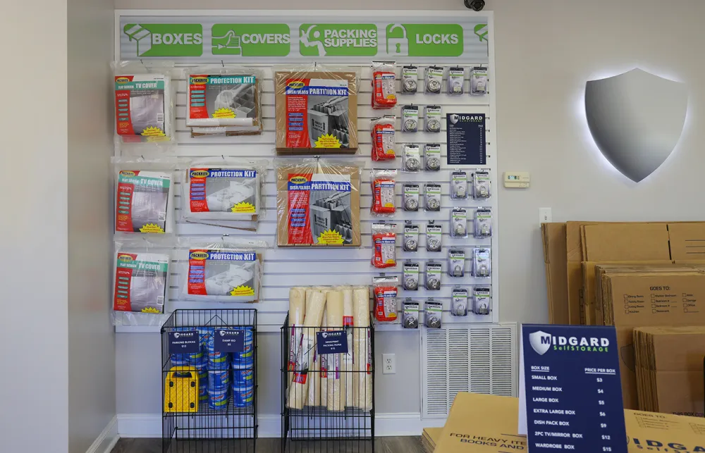 a shelf with boxes and items on it