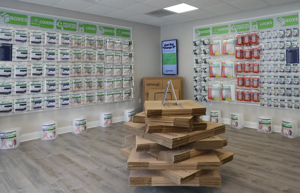 a room with shelves of boxes and boxes