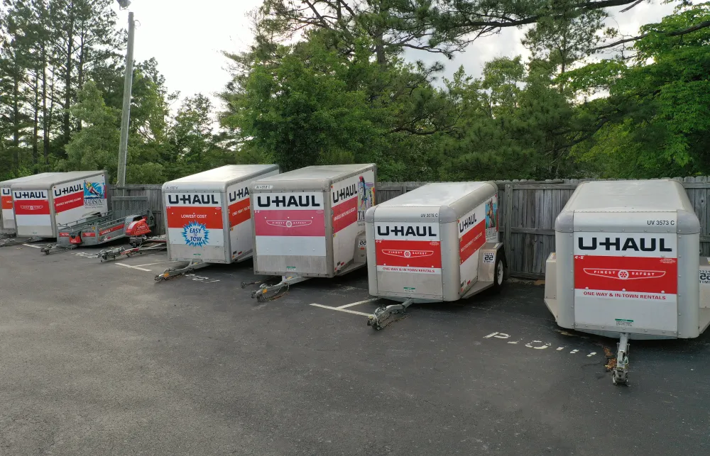 a group of white and red containers