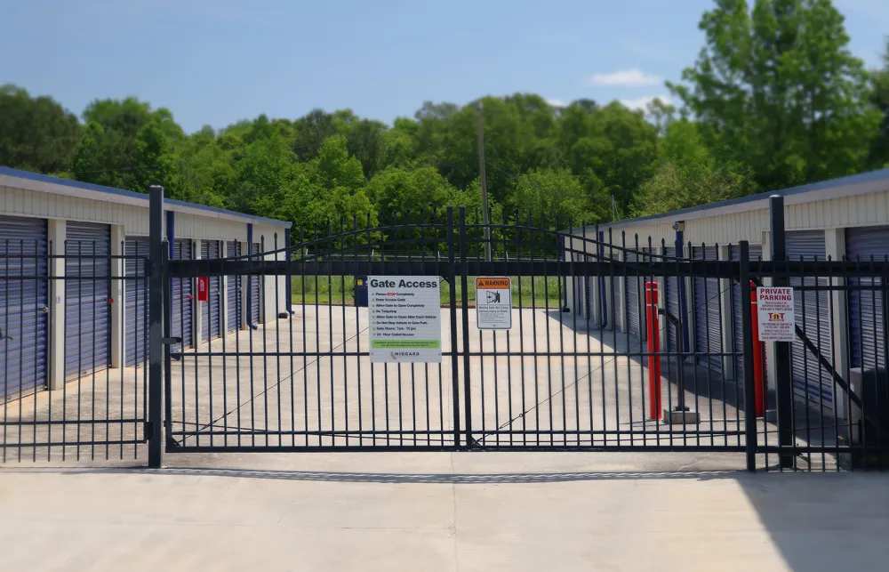 a gate with signs on it