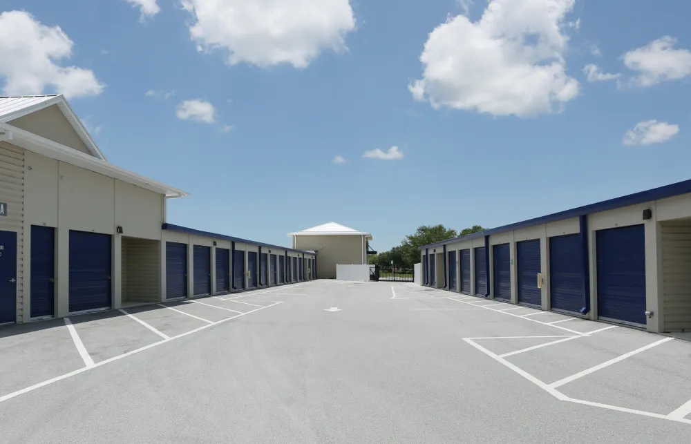 a parking lot with several garages