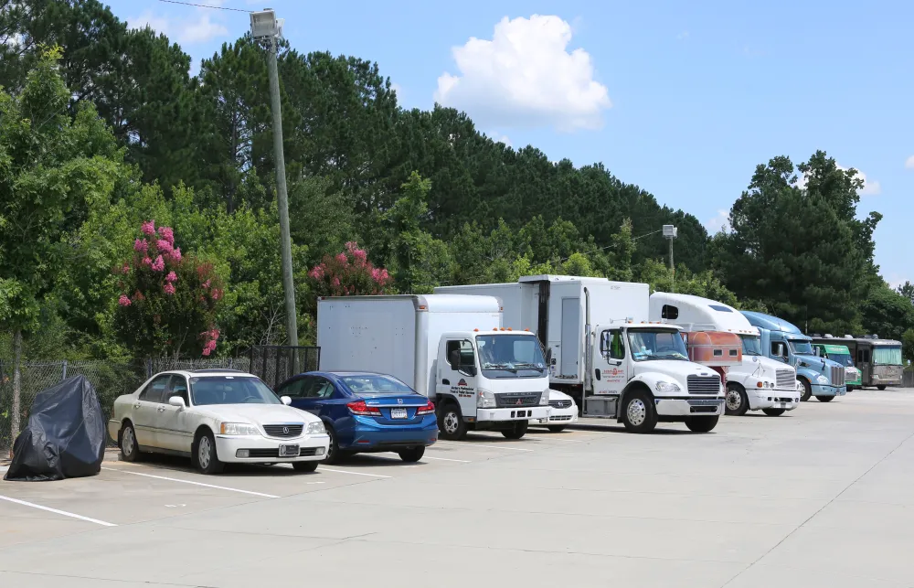 a group of cars parked in a parking lot