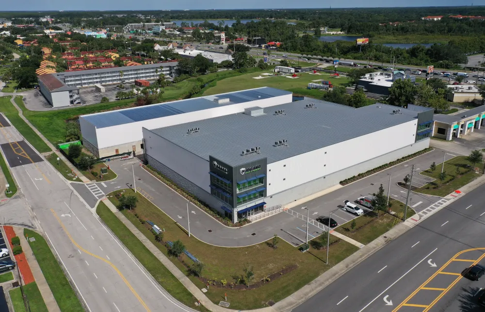 a large building with a parking lot