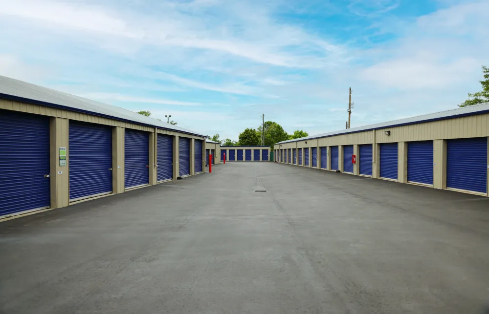 a group of buildings with blue doors