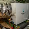 Indoor air quality system Ultra-Aire dehumidifier installed with insulated HVAC ductwork and wiring in basement.