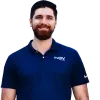 Joe Peavey wearing a blue shirt