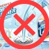 Powerful drain cleaner bottle with liquid flowing into drain and red prohibition symbol over it