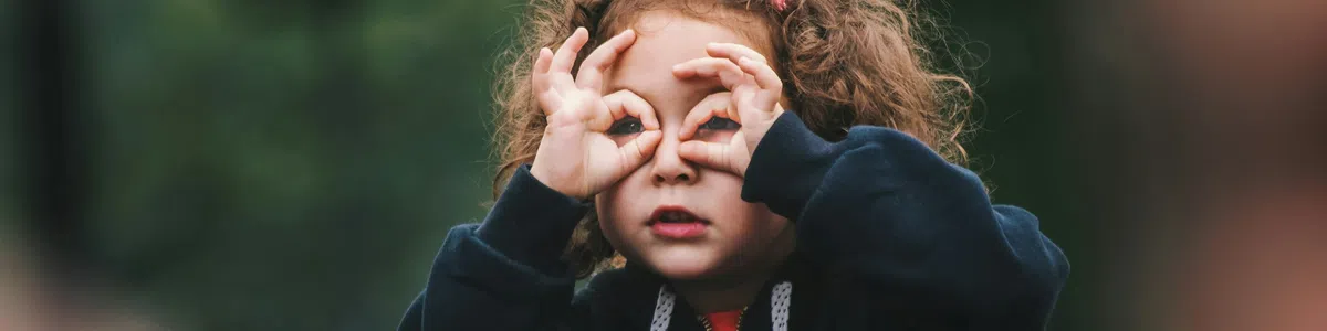 a person with the hands on the face